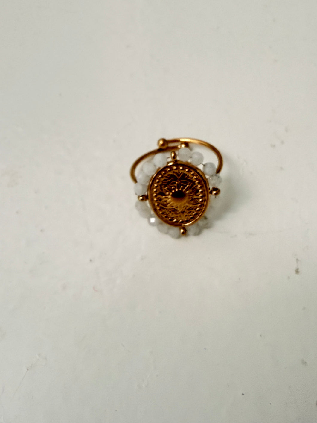 Gold oval stone ring