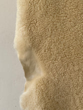 Fluffy offwhite sheep skin