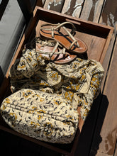 Beige printed pouches