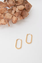 oval long thick gold earrings