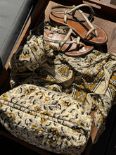 Beige printed pouches