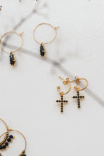 Black cross stone