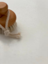Face brush hanging