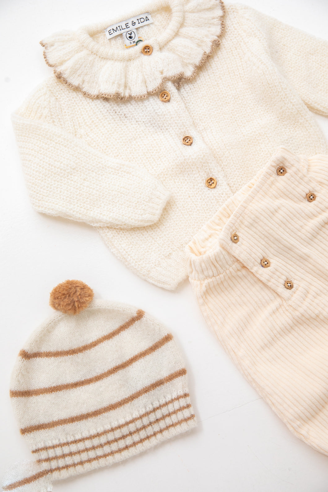 Knitted frill neck cream cardigan