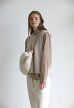 Oversized fur bumbag