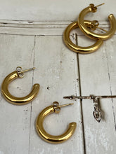 Thick Hoop earrings three quarter