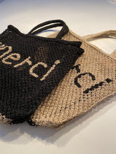 Merci black bag