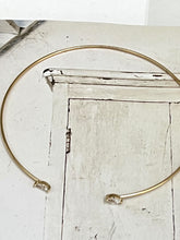 Thin bangle with joining diamond shaped stones