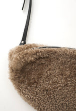Oversized fur bumbag