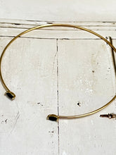Thin bangle with joining diamond shaped stones