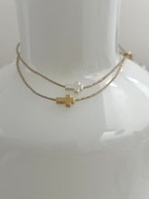 Thick cross bracelet on lurex string