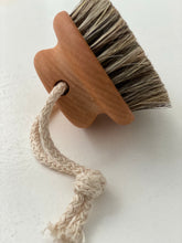 Massage brush hanging
