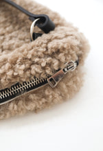 Oversized fur bumbag