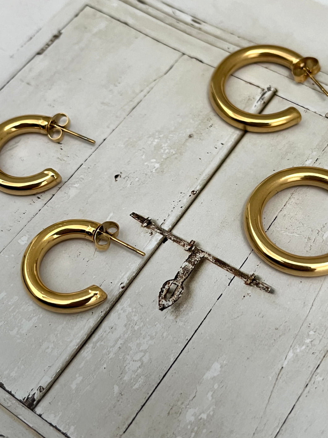 Thick Hoop earrings three quarter