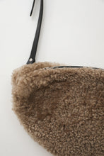 Oversized fur bumbag
