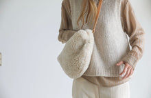 Oversized fur bumbag