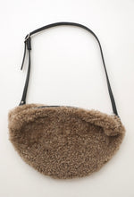 Oversized fur bumbag